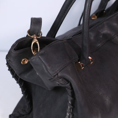 Ladies Black Leaher Handbag With Vinyl Trim And Metal Hardware.