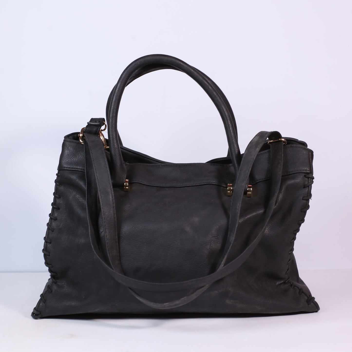 Ladies Black Leaher Handbag With Vinyl Trim And Metal Hardware.